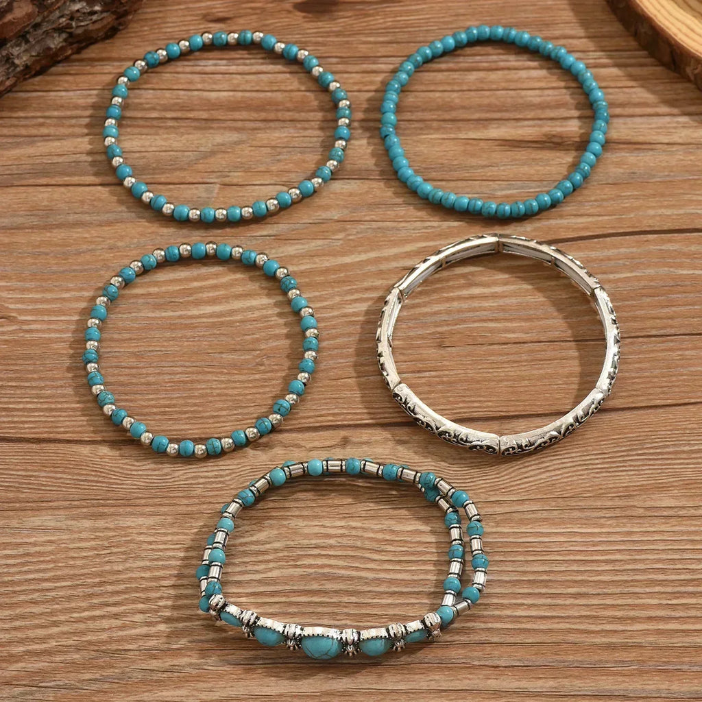 Armbandenset met turquoise kralen